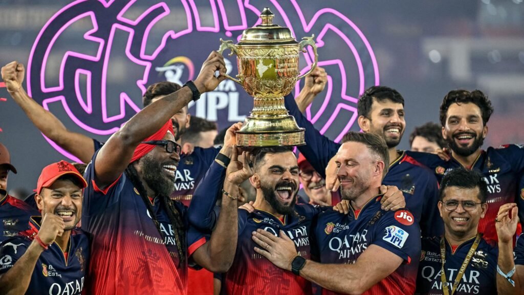 Virat kohli’s 75* powers rcb to historic back-to-back ipl title win over gujarat titans 4 Rcb ipl winner's celebrating with trophy